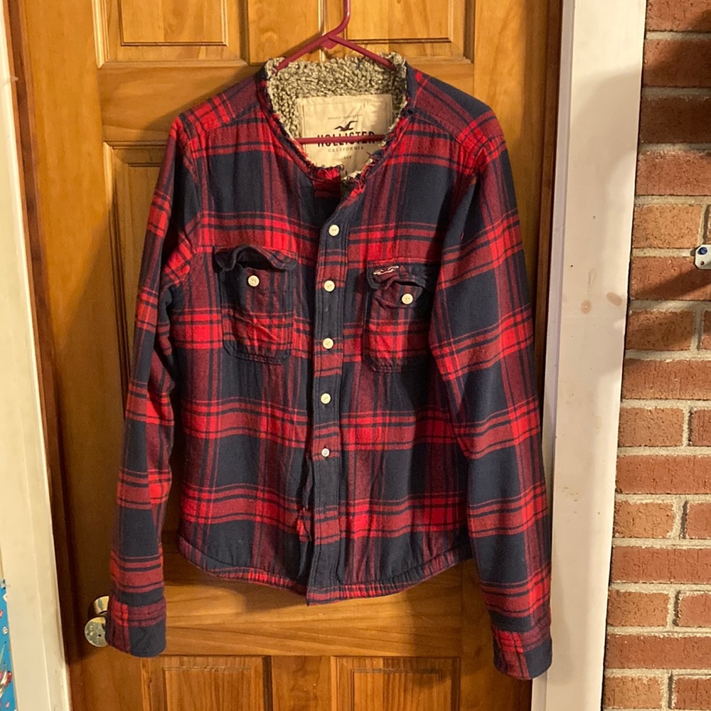 Hollister Large red/blue flannel button up. Sherpa lined. Had a hood. Good deal